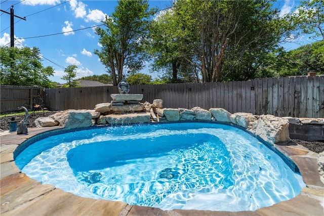 view of pool with a fenced backyard and a fenced in pool