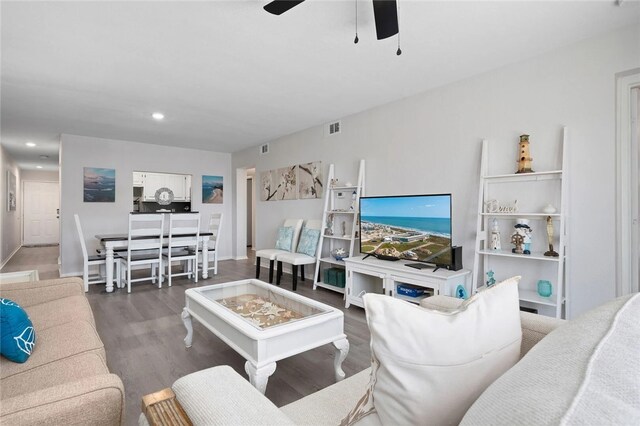 5973 State Highway 361 Unit 123, Port Aransas, TX 78373 - living area featuring wood finished floors, a ceiling fan, and recessed lighting