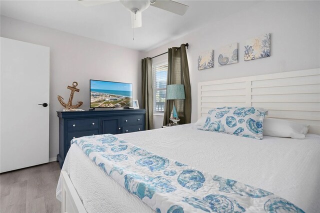 5973 State Highway 361 Unit 123, Port Aransas, TX 78373 - bedroom with wood finished floors and ceiling fan