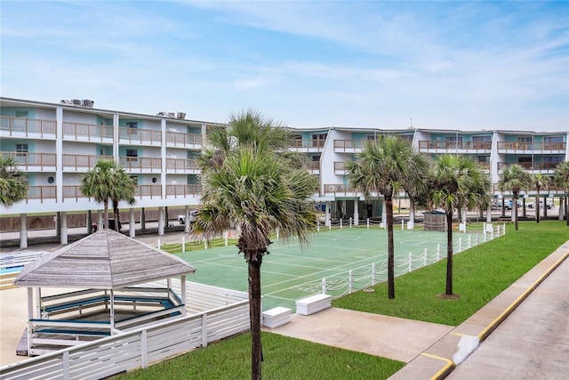 5973 State Highway 361 Unit 123, Port Aransas, TX 78373 - surrounding community with shuffleboard and a yard