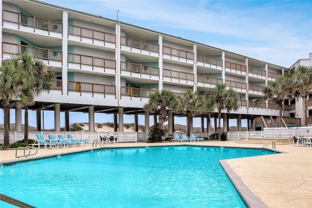 5973 State Highway 361 Unit 123, Port Aransas, TX 78373 - community pool with a patio area