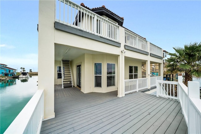 738 Crown Hbr, Corpus Christi, TX 78402 - wooden deck with stairs and a water view