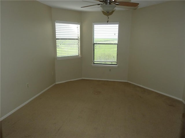 4401 River Valley Dr, Corpus Christi, TX 78410 - spare room with ceiling fan and light colored carpet