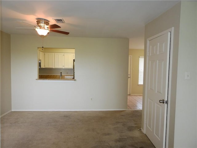 4401 River Valley Dr, Corpus Christi, TX 78410 - empty room featuring carpet flooring and a ceiling fan
