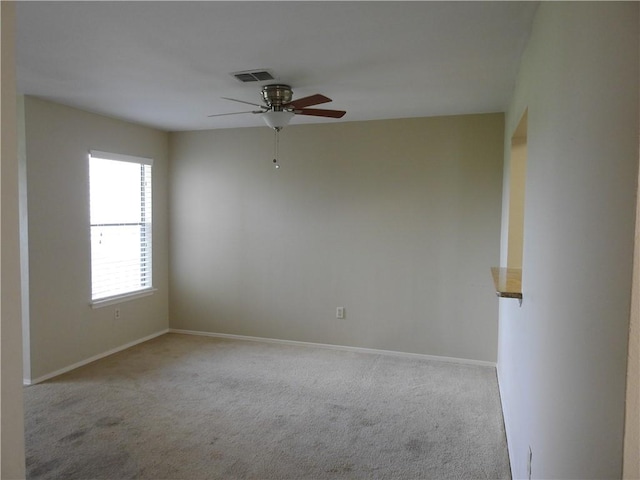 4401 River Valley Dr, Corpus Christi, TX 78410 - carpeted empty room with a ceiling fan and baseboards