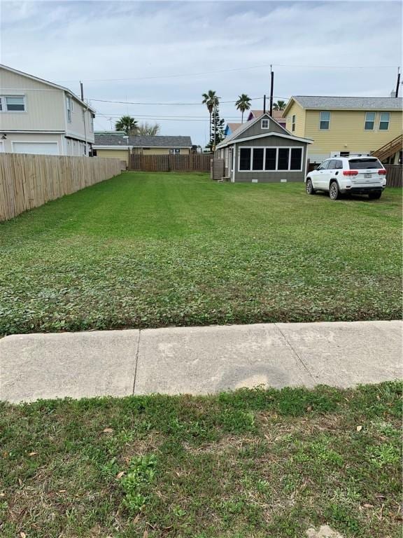 view of yard featuring fence