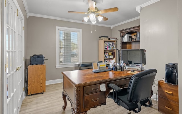 office featuring ceiling fan, light wood-type flooring, and ornamental molding