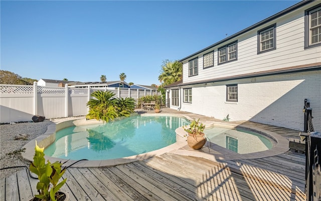 view of pool featuring a deck