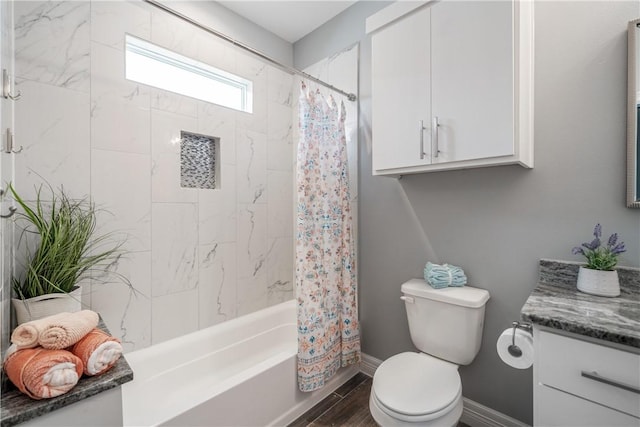 full bathroom with shower / bathtub combination with curtain, vanity, and toilet