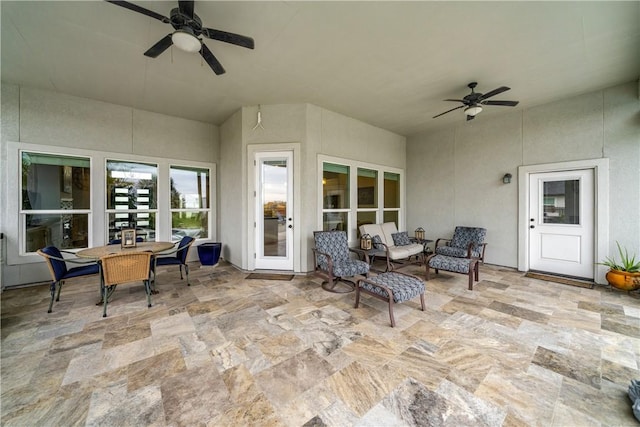 view of patio featuring ceiling fan