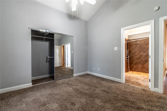 unfurnished bedroom with carpet flooring, a ceiling fan, baseboards, and a closet