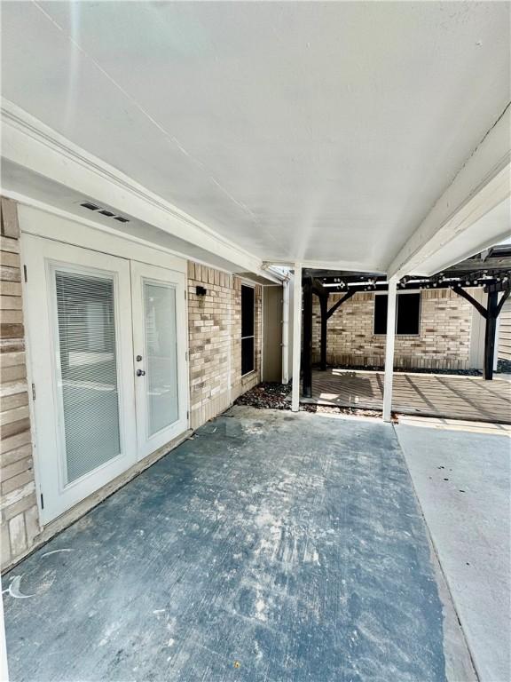 view of patio / terrace featuring french doors