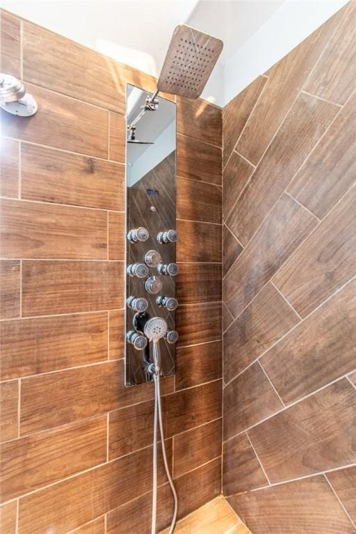 room details with a tile shower