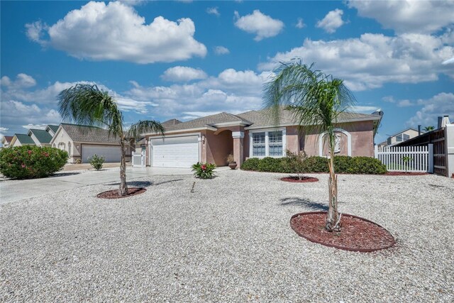 ranch-style home with a garage