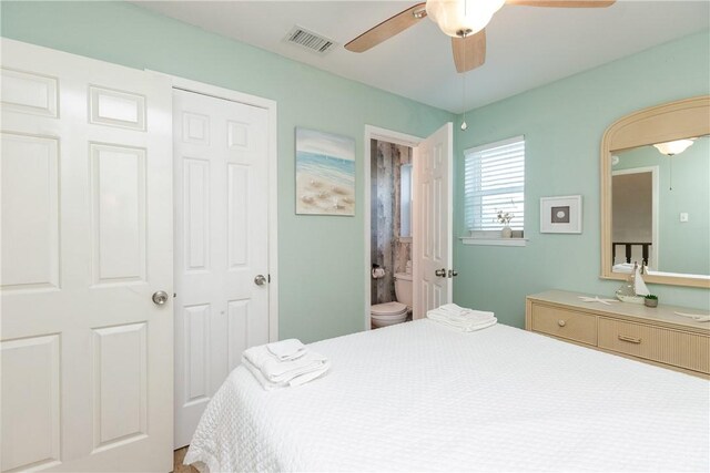 bedroom with a ceiling fan and visible vents