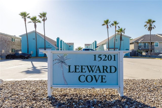 community / neighborhood sign featuring a residential view