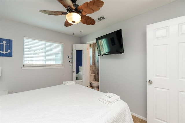 bedroom with visible vents, connected bathroom, and ceiling fan