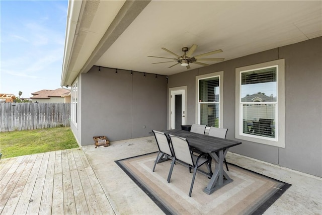 wooden deck with ceiling fan