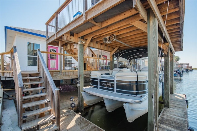 dock area featuring a water view