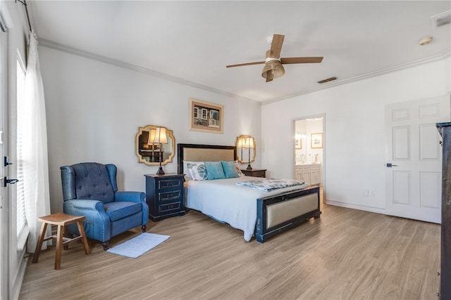 bedroom with light hardwood / wood-style floors, ceiling fan, ensuite bath, and crown molding