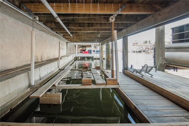 dock area featuring a water view