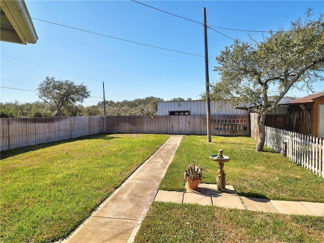 view of yard featuring a fenced backyard