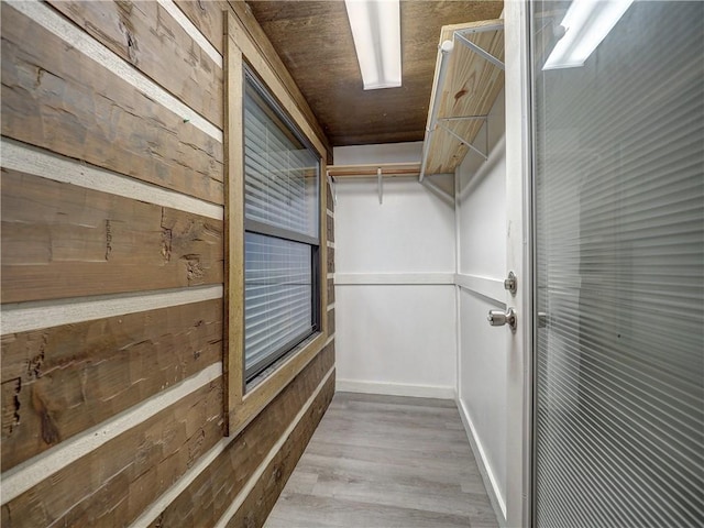 walk in closet featuring light wood-type flooring