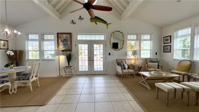 doorway with light tile patterned floors, french doors, beamed ceiling, and plenty of natural light