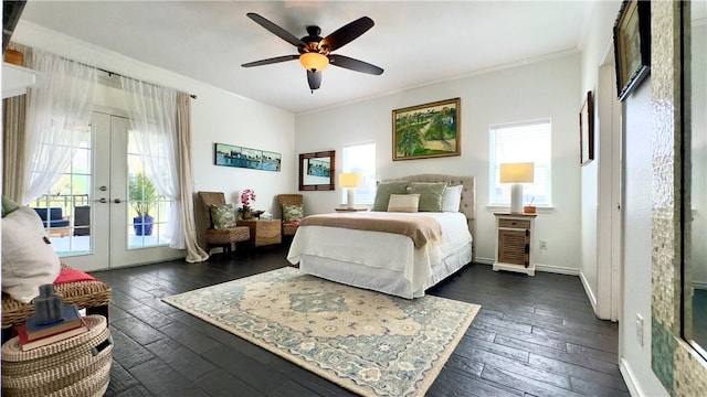 bedroom with access to outside, multiple windows, ornamental molding, and french doors