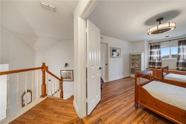 bedroom with hardwood / wood-style flooring