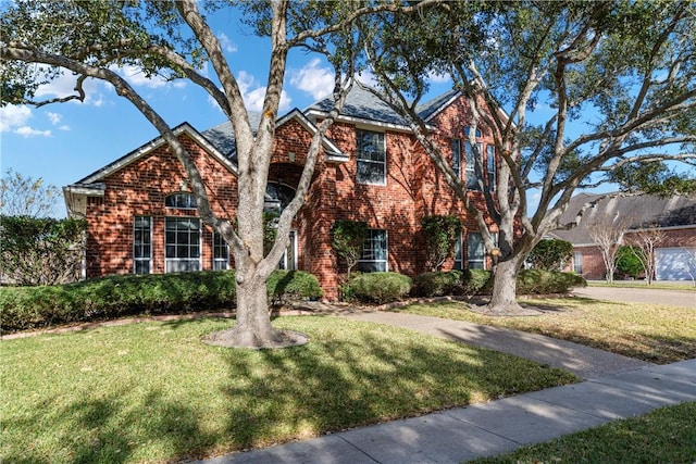 view of front of property with a front lawn