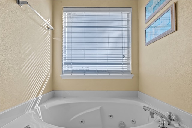 bathroom with a bathing tub