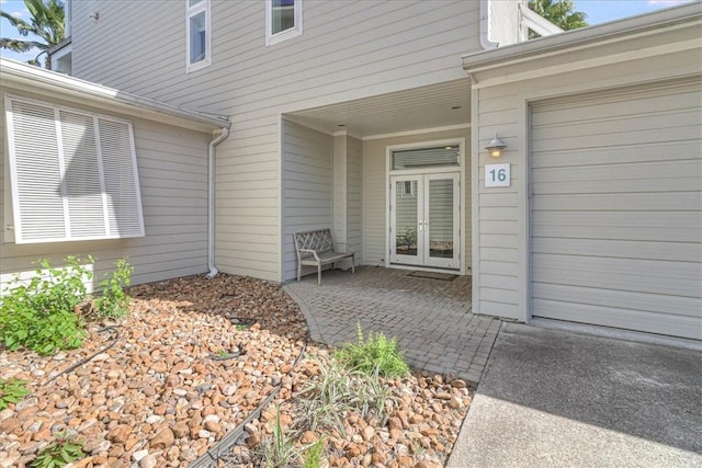 entrance to property with french doors and a patio