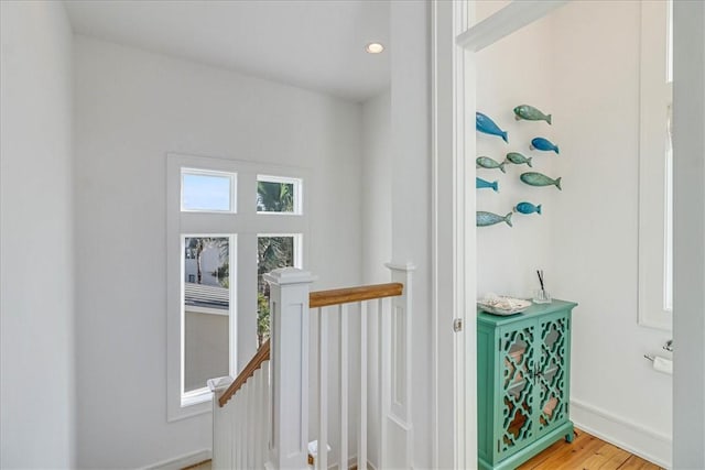 staircase featuring hardwood / wood-style flooring