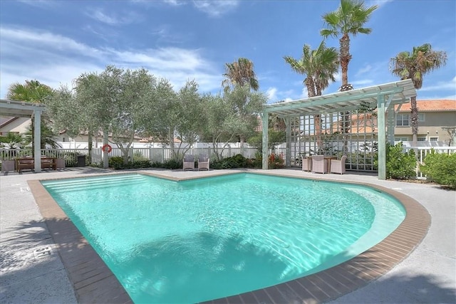 view of pool featuring a pergola and a patio