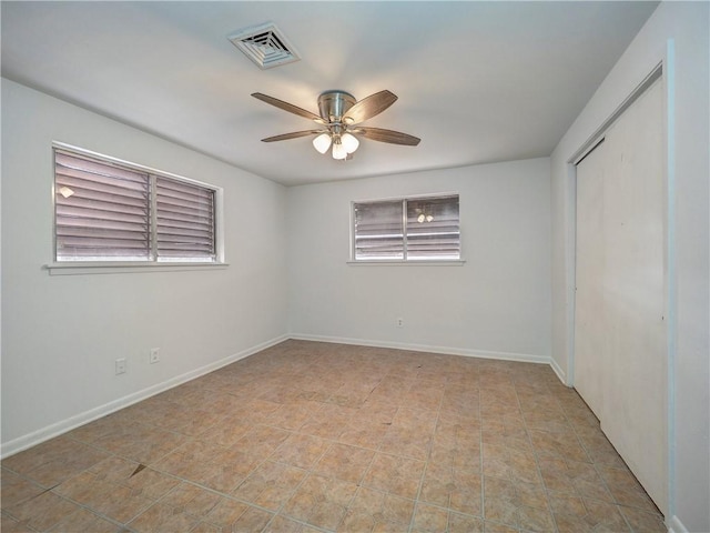 empty room with ceiling fan