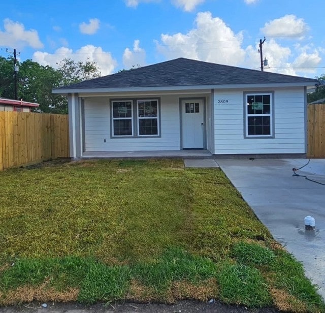 2809 Tarlton St, Corpus Christi, TX 78405 - view of front facade with covered porch and a shingled roof