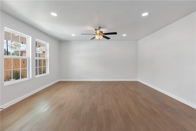 2809 Tarlton St, Corpus Christi, TX 78405 - unfurnished room with recessed lighting, a ceiling fan, and wood finished floors