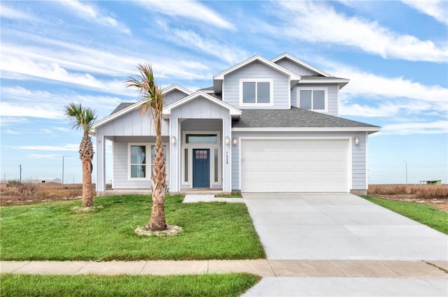 view of front facade with a garage and a front yard