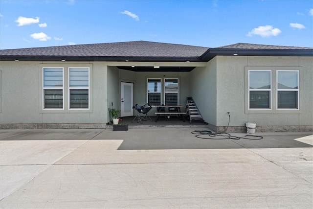 rear view of property with a patio area