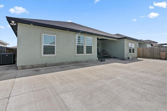 back of property featuring a patio area