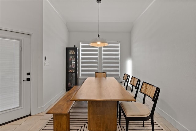 dining space with light tile patterned floors