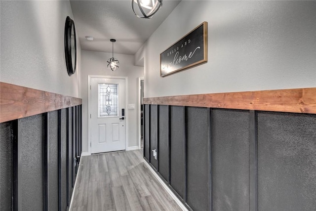 doorway featuring light hardwood / wood-style floors