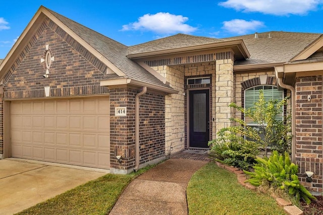 view of front of home with a garage