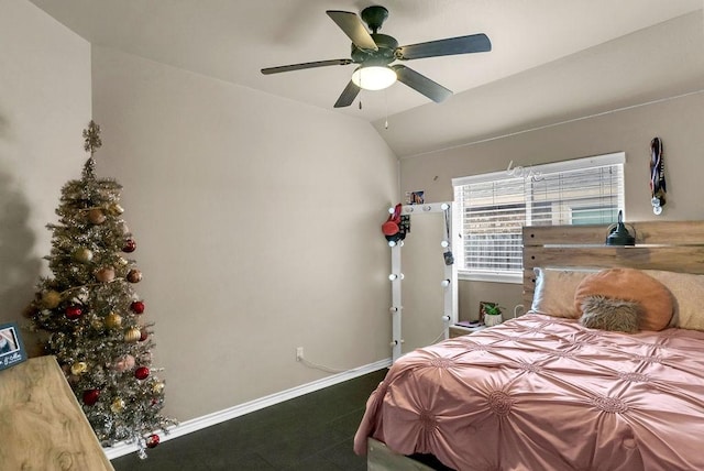 bedroom featuring ceiling fan and vaulted ceiling