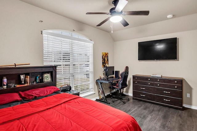 bedroom with dark hardwood / wood-style floors, ceiling fan, and lofted ceiling