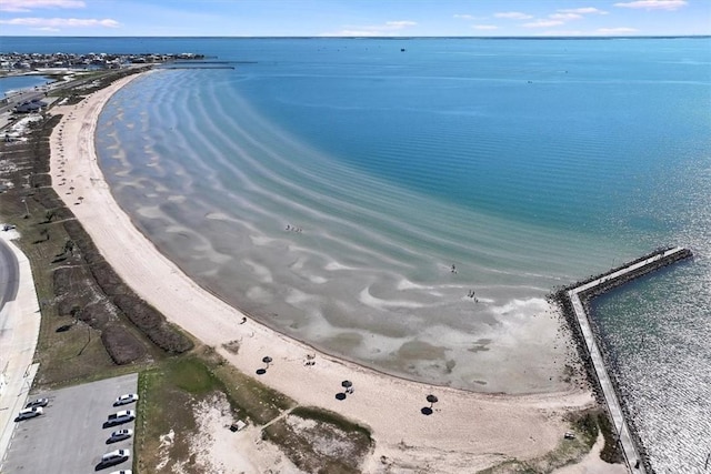 drone / aerial view with a view of the beach and a water view