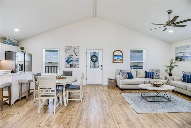 living room with recessed lighting, light wood-style flooring, high vaulted ceiling, and a ceiling fan