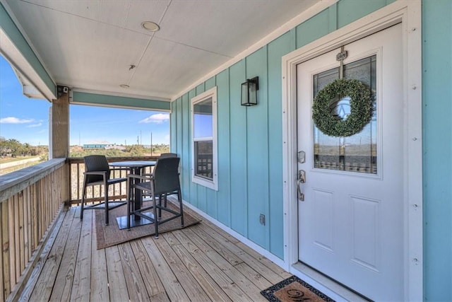 deck featuring outdoor dining area