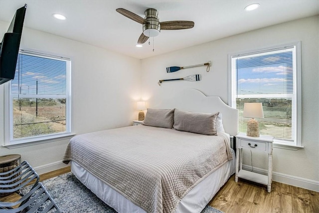 bedroom featuring recessed lighting, baseboards, and light wood finished floors